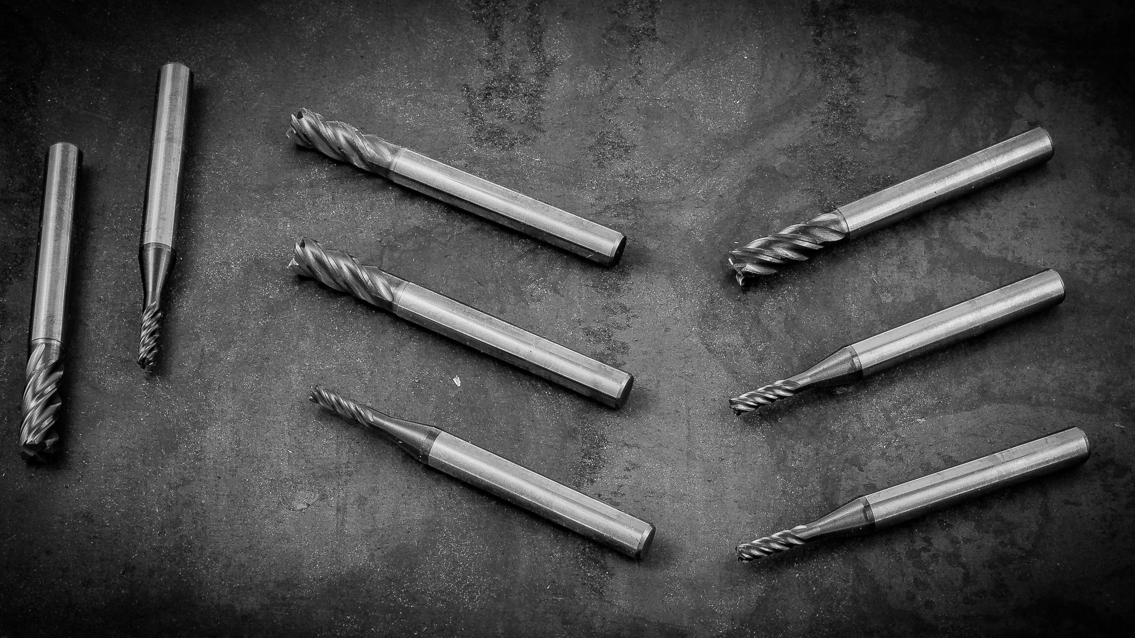 High performance end mills for low and high alloy steel